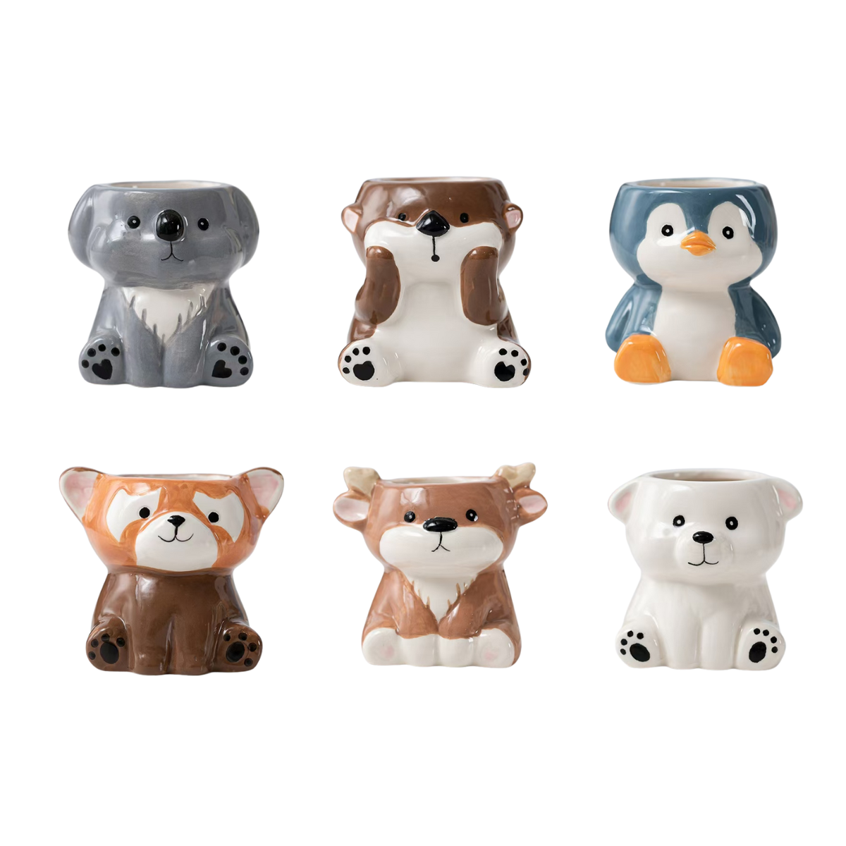 Set of six animal-themed ceramic planters on a white background